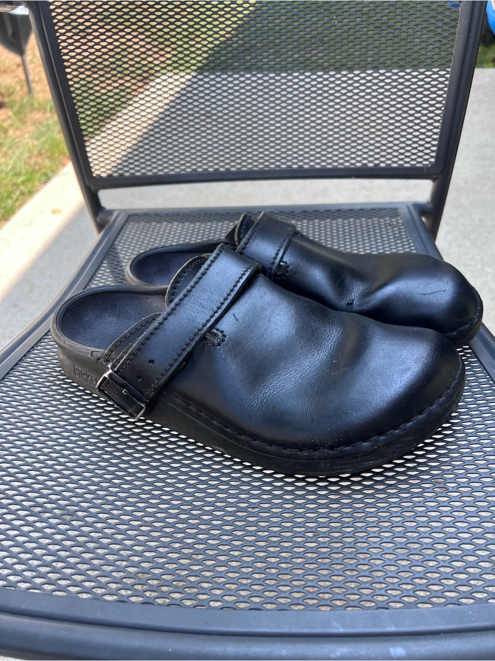 Birkenstock Black Leather Clogs with Adjustable Strap